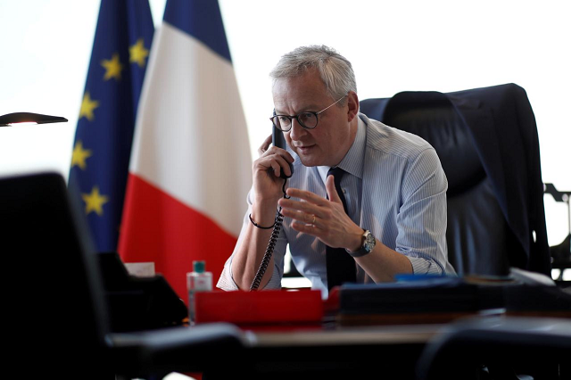 french economy and finance minister bruno le maire speaks on the phone at the bercy finance ministry in paris france april 14 2020 photo reuters
