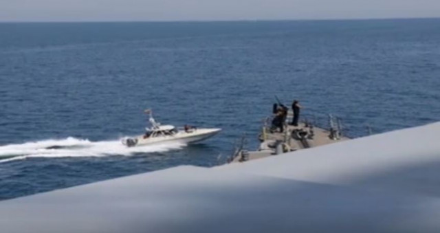 after about an hour the iranian ships left said the us military in their statement photo reuters after about an hour the iranian ships left said the us military in their statement photo reuters