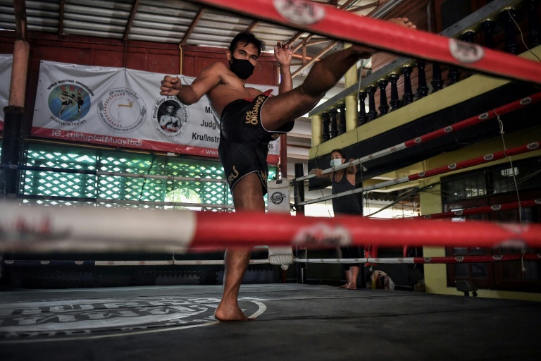 the boxing community must band together to help the most financially vulnerable fighters says youssef boughanem muay thai 039 s world middleweight champion and the owner of a pattaya based gym photo afp