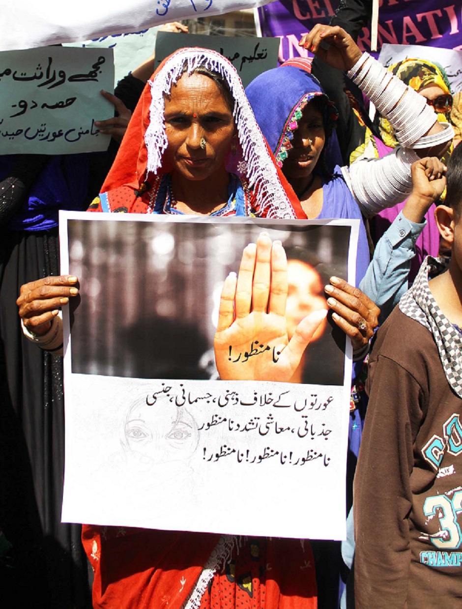 Members of Community Action Group holding banners and placards during rally in Hyderabad. PHOTO: ONLINE