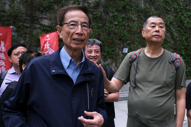 hong kong politician martin lee and founder of next media jimmy lai march during a protest to demand authorities scrap a proposed extradition bill with china in hong kong china march 31 2019 photo reuters