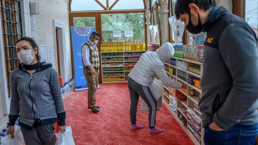 with mass prayers suspended the dedeman mosque in istanbul has turned itself into a food bank photo afp