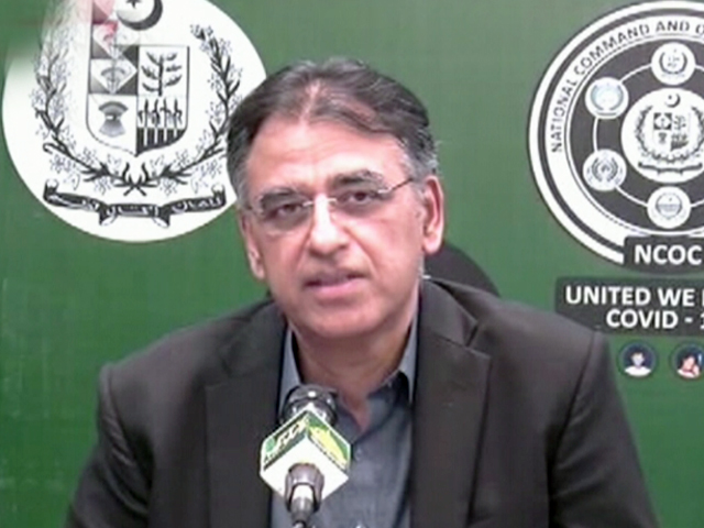federal minister for planning asad umar addresses a news conference screengarb