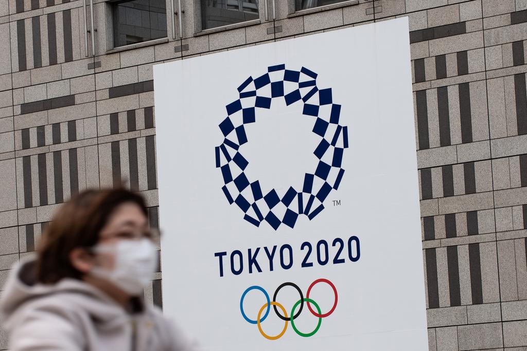 mori noted the games had been cancelled previously only during wartime and compared the battle against coronavirus to quot fighting an invisible enemy quot photo afp