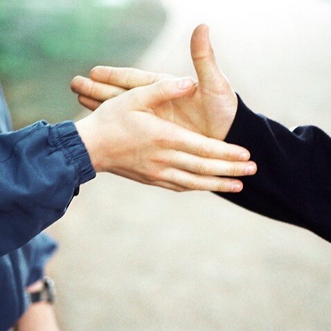 what will replace handshake a fist or elbow bump photo file