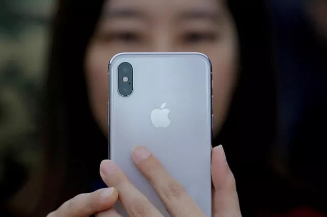an attendee uses a new iphone x during a presentation for the media in beijing china october 31 2017 photo reuters an attendee uses a new iphone x during a presentation for the media in beijing china october 31 2017 photo reuters