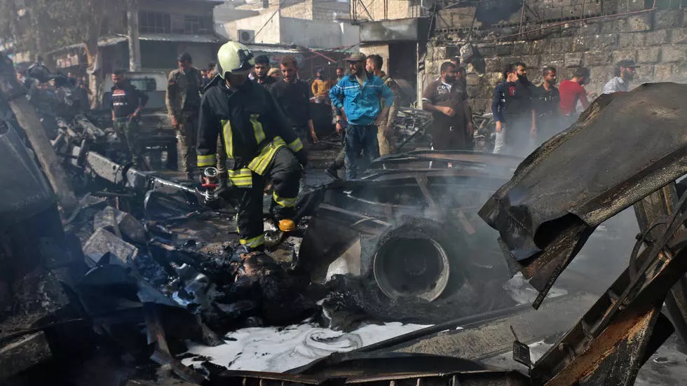 a picture released by the syrian civil defence rescue workers shows the scene of a fuel truck bomb on april 28 2020 in the northern syrian city of afrin photo afp