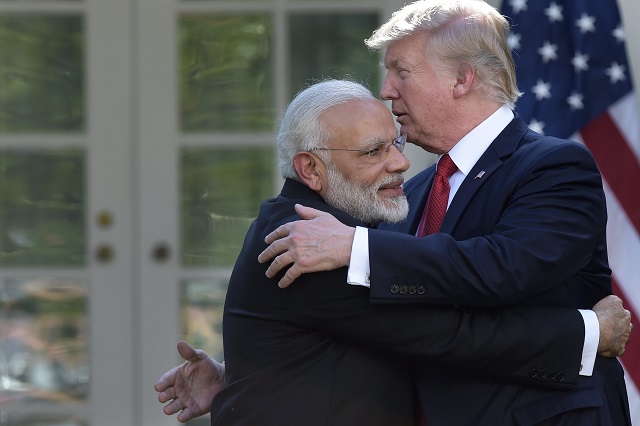 a file photo of president donald trump and indian prime minister narendra modi embracing each other after speaking to the media outside the oval office in 2017 photo cnn