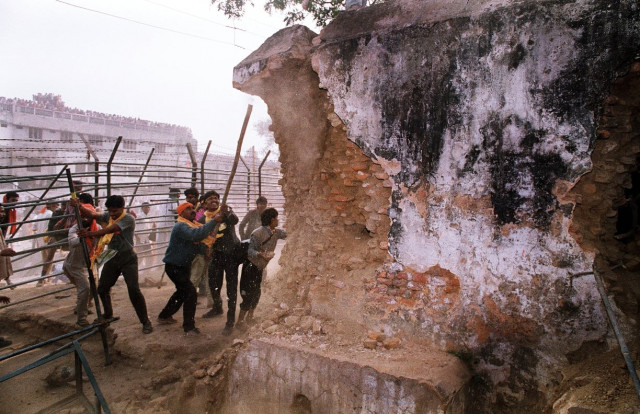 in this december 6 1992 photograph indian hindu fundamentalists attack the wall of the 16th century babri masjid mosque with iron rods at a disputed holy site in the city of ayodhya photo afp in this december 6 1992 photograph indian hindu fundamentalists attack the wall of the 16th century babri masjid mosque with iron rods at a disputed holy site in the city of ayodhya photo afp