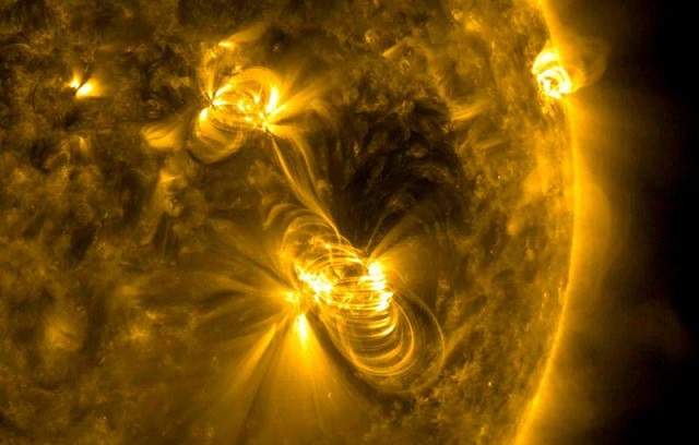 a medium sized m2 solar flare and a coronal mass ejection cme erupting from the same large active region of the sun on july 14 2017 photo reuters