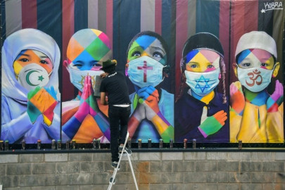 famed muralist kobra paints a message of co existence famed muralist kobra paints a message of co existence