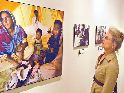 commemorating efforts picture exhibit documentary to mark first anniversary of floods