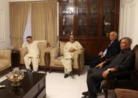 ghulam nabi bahrani father in law of faisal jatoi the co pilot first officer of the k2 airways boeing 737 cargo plane that crashed in the arabian sea sits with guests at his home in karachi pakistan july 8 2026 photo reuters