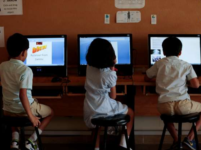 students use computers in the technology lab at a private school in islamabad pakistan photo reuters