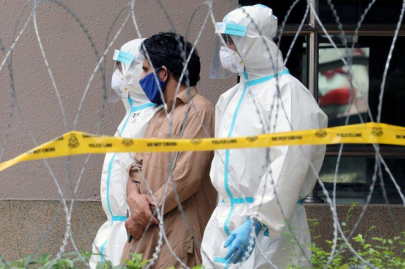 malaysia rounding up migrants to contain coronavirus spread police say malaysia rounding up migrants to contain coronavirus spread police say