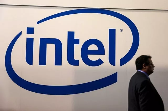 a visitor passes an intel logo at the mobile world congress in barcelona spain february 26 2018 photo reuters