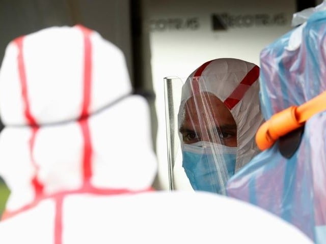 medical staff is seen in an ambulance as they transfer a patient from a nursing home to a hospital as the spread of the coronavirus disease covid 19 continues in rome italy photo reuters file