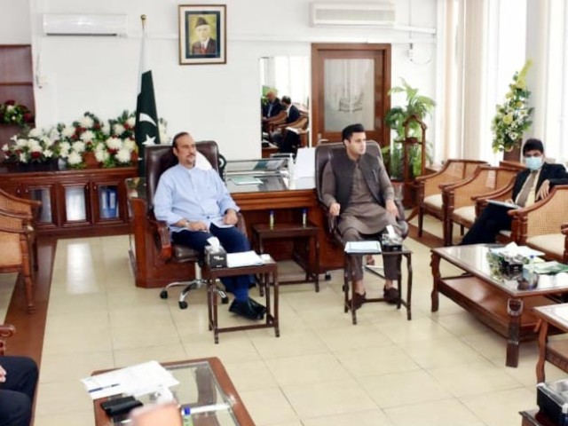 advisor to pm on parliamentary affairs dr zaheer uddin babar chairing a meeting in islamabad on i voting overseas voting photo pid