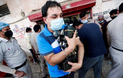 india s delhi imposes 70 corona tax on alcohol to deter large crowds