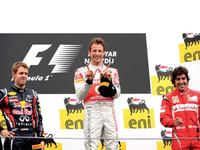 classy button marks 200th grand prix with sensational win