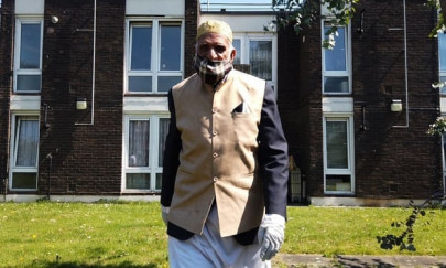 100 year old muslim walks garden laps for virus victims while fasting 100 year old muslim walks garden laps for virus victims while fasting