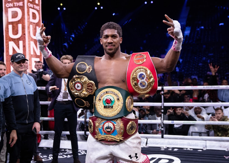 eddie hearn is considering moving joshua 039 s next fight against kubrat pulev which was originally scheduled for the tottenham hotspur stadium on june 20 photo afp