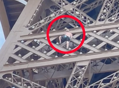 climber held for trying to scale eiffel tower climber held for trying to scale eiffel tower