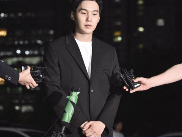 suga appeared apologetic as he appeared before the press outside the police station photo file suga appeared apologetic as he appeared before the press outside the police station photo file