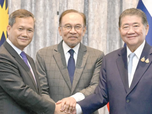 malaysia s pm anwar ibrahim c cambodia s pm hun manet and thailand s acting pm phumtham wechayachai r shake hands in putrajaya photo afp malaysia s pm anwar ibrahim c cambodia s pm hun manet and thailand s acting pm phumtham wechayachai r shake hands in putrajaya photo afp