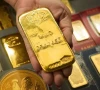 gold falls despite 2 global surge