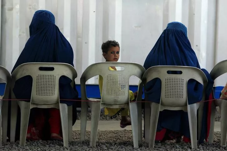 afghan refugees are seen at unhcr s voluntary repatriation centre in peshawar photo reuters afghan refugees are seen at unhcr s voluntary repatriation centre in peshawar photo reuters