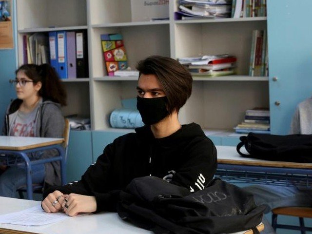 some students in athens wore masks in class greece reopened high schools for final year pupils with a reduced number of students per classroom photo afp