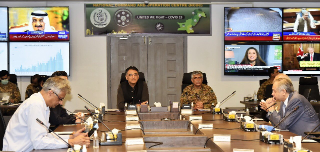 planning minister asad umar is chairing a national command and operation centre ncoc meeting in islamabad photo pm office