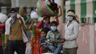 pandemic hits india s poorest trying to return home pandemic hits india s poorest trying to return home