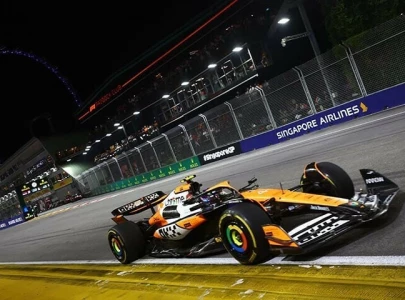 lando norris triumphs at singapore grand prix chipping away at max verstappen s championship lead