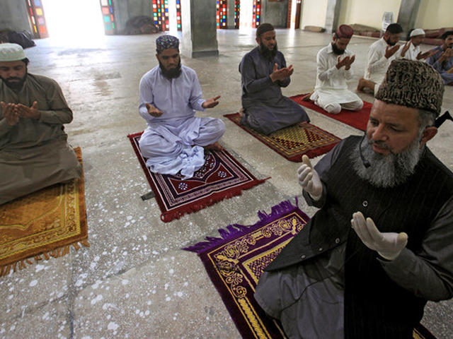 worshippers maintain safe distance as they attend friday prayer in lahore photo reuters file