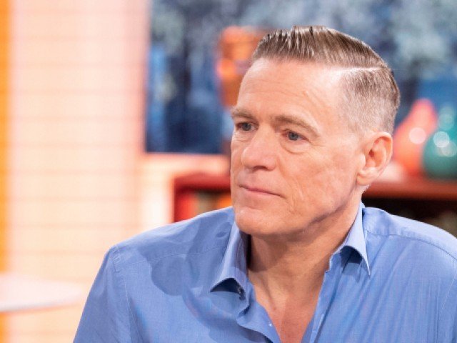 bryan adams apologises for racist remarks