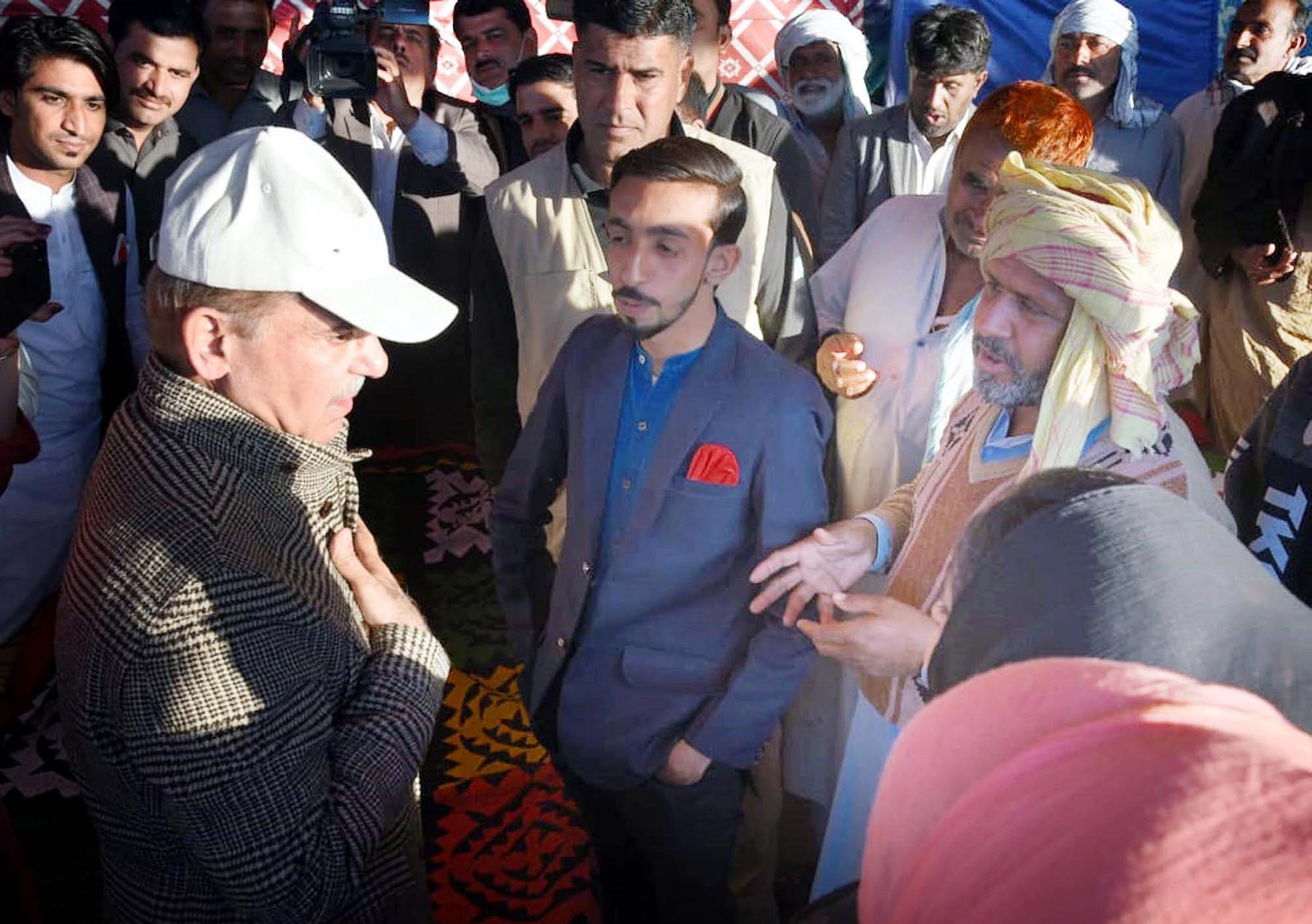 m shehbaz sharif interacts with flood victims in kot diji in khairpur district photo ppi