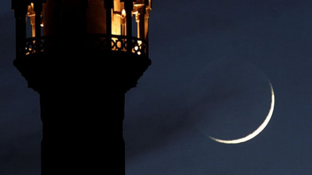 a crescent moon rises close to an illuminated minaret of mosque in amman photo reuters a crescent moon rises close to an illuminated minaret of mosque in amman photo reuters