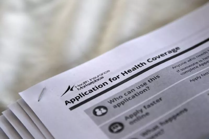 representational image showing a form for health coverage photo reuters representational image showing a form for health coverage photo reuters