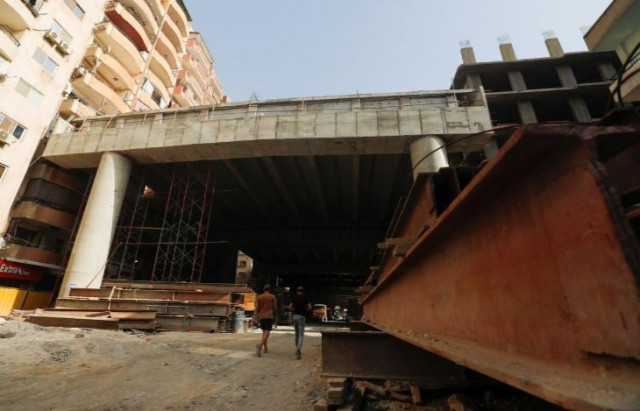 some have joked on social media that residents of blocks next to the new road could sell petrol or other supplies to passing motorists photo reuters some have joked on social media that residents of blocks next to the new road could sell petrol or other supplies to passing motorists photo reuters