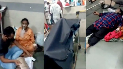 videos show indian hospitals treating covid 19 patients next to dead bodies videos show indian hospitals treating covid 19 patients next to dead bodies