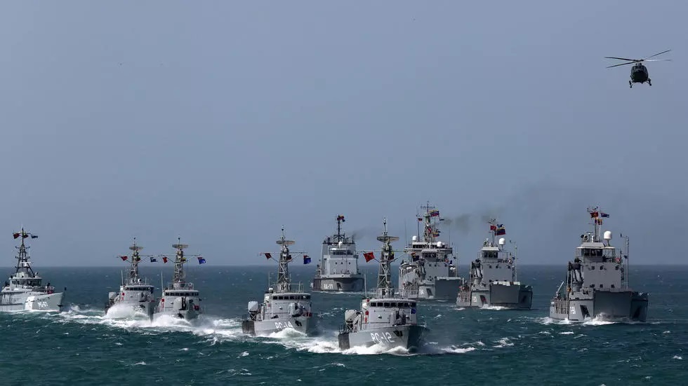venezuela said it would deploy naval vessels like these frigates   here on a 2019 exercise   to welcome iranian tankers bringing much needed gasoline photo afp