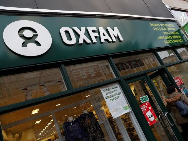 a sign is seen above a branch of oxfam in london britain photo reuters file