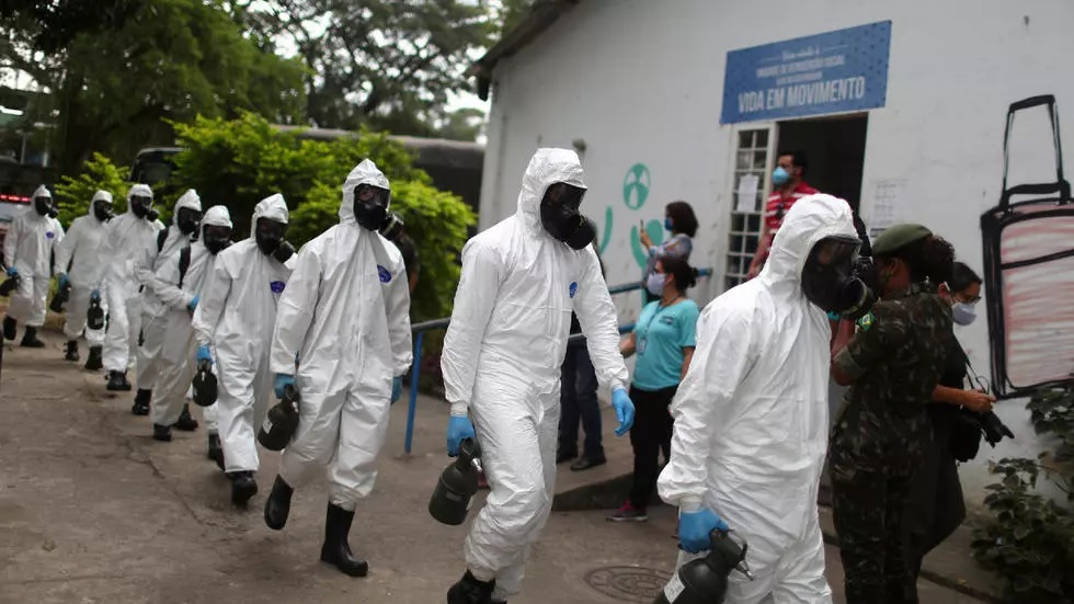 brazilian army officers wearing protective gears arrive to disinfect the shelter stella maris complex for elderly people homeless and patients with mental disorders managed by the rio de janeiro city hall amid concerns of the spread of the coronavirus disease covid 19 in rio de janeiro brazil may 14 2020 photo reuters