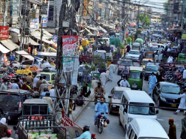 vehicles are caught in traffic jam due to the rush of buyers at a market in rawalpindi ahead of eid photo agha mehroz vehicles are caught in traffic jam due to the rush of buyers at a market in rawalpindi ahead of eid photo agha mehroz