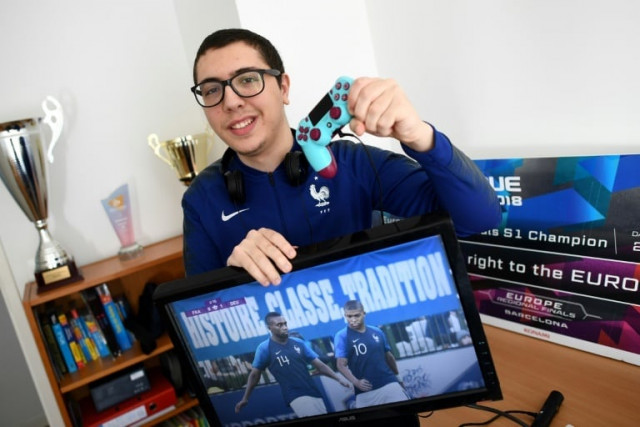 instead of kylian mbappe harry kane or cristiano ronaldo racing around the pitch gamers will slug it out contesting the first ever eeuro from their armchairs photo afp instead of kylian mbappe harry kane or cristiano ronaldo racing around the pitch gamers will slug it out contesting the first ever eeuro from their armchairs photo afp