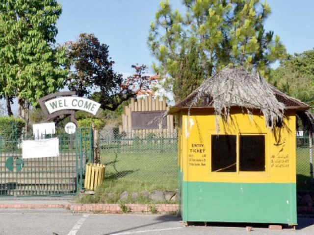 a locked gate and closed ticket booth seen outside japan park in islamabad on tuesday photo zafar raja express a locked gate and closed ticket booth seen outside japan park in islamabad on tuesday photo zafar raja express