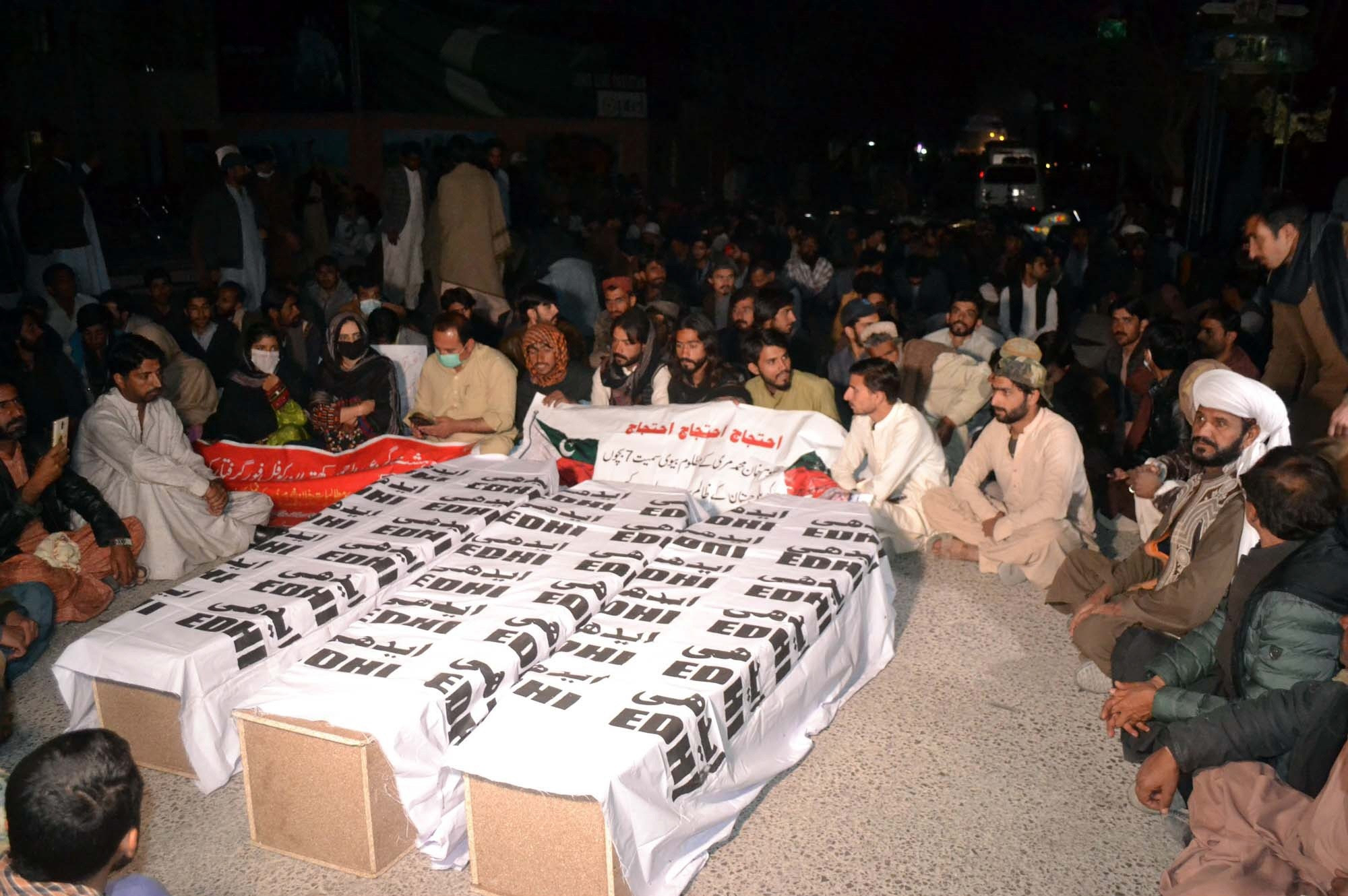 people protest outside the dc s office in quetta against the triple murder photo ppi