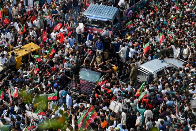 pti supporters take part in a rally to mark the international labour day in lahore photo nni pti supporters take part in a rally to mark the international labour day in lahore photo nni